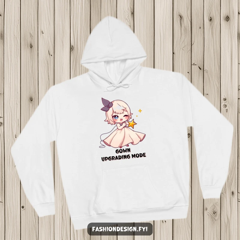 Funny Seamstress Hoodie: A mischievous character stitches a tiny winking star onto a flowing gown, a cozy and funny gift.