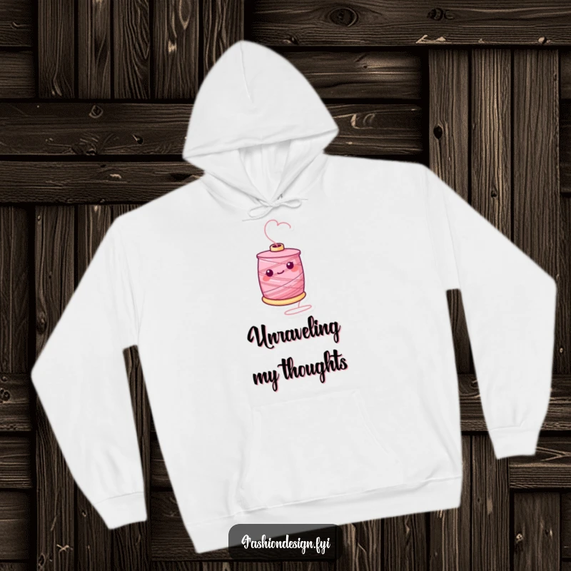 Funny hoodie featuring a cheerful spool of thread in motion, symbolizing creativity and a love for all things handmade.
